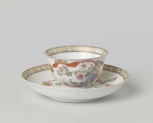 Bell-shaped cup and saucer with crane near a peony plant and rock by anonymous
