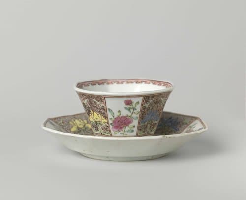 Octagonal cup and saucer with flower sprays and lotus scrolls by anonymous