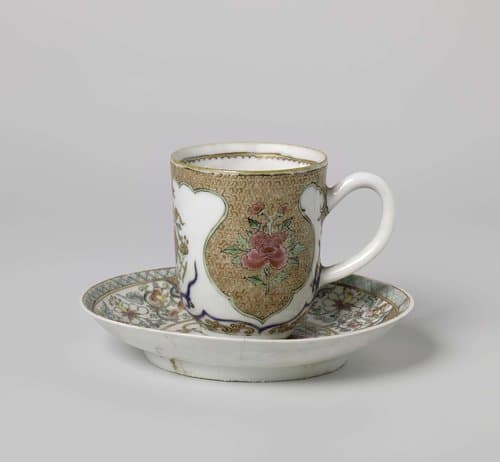 Cup with handle and saucer with fruit basket by anonymous