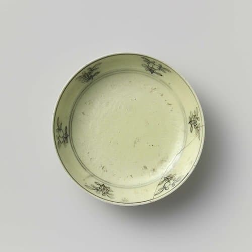 Saucer with pearl chasing dragons and flowering plants by anonymous