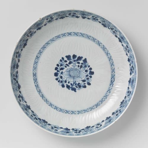Saucer-dish with flower sprays and incised flower petals by anonymous