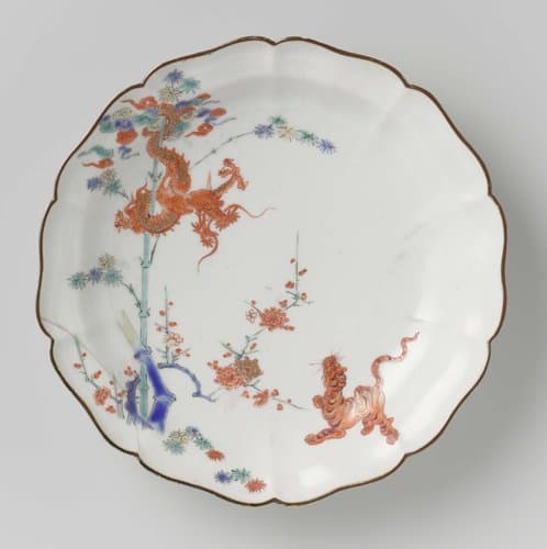 Lobed dish with dragon, tiger, bamboo and prunus by anonymous