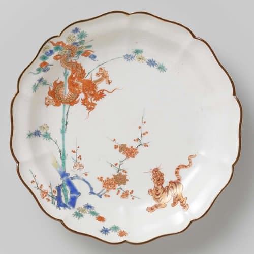 Lobed dish with dragon, tiger, bamboo and prunus by anonymous