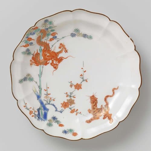 Lobed dish with dragon, tiger, bamboo and prunus by anonymous