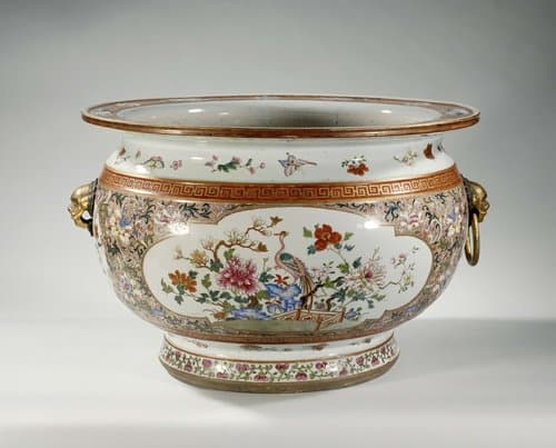 Fish bowl with floral scrolls, flowering plants, birds and insects by anonymous