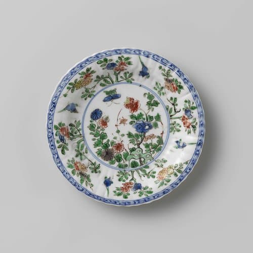 Fluted saucer with rocks, flower sprays and birds by anonymous