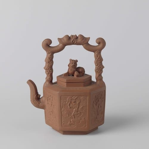 Hexagonal tea pot with a figure on a dragon's head amid waves by anonymous