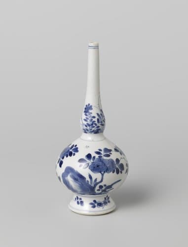 Rosewater sprinkler or bottle vase with flowering plants near a rock by anonymous