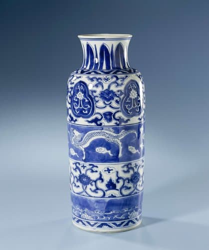 Cilindrical vase with dragons and floral scrolls by anonymous