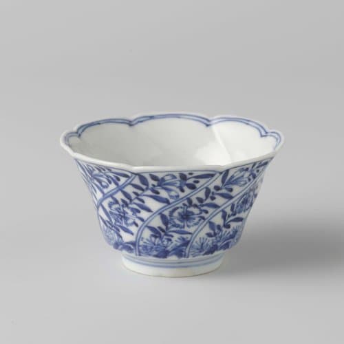 Cup with moulded, twisted panels with flower sprays by anonymous