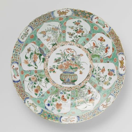 Dish with flowerbasket and petal-shaped panels by anonymous