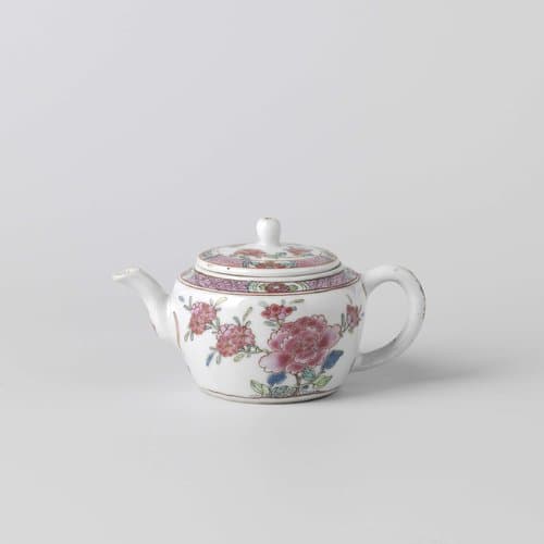 Tea pot with flowering plants and diaper patterns by anonymous