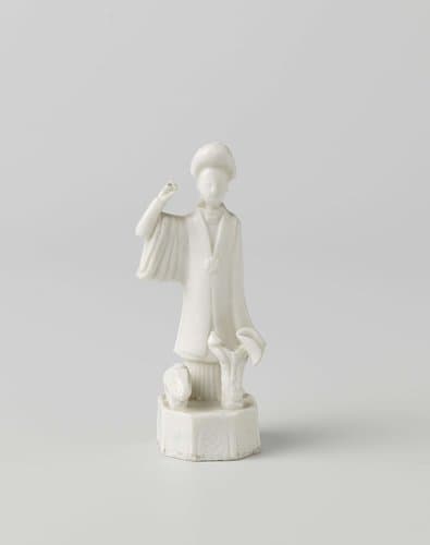 Figure of a woman with a rabbit and fungus by anonymous