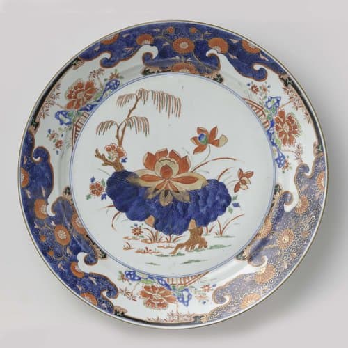 Dish with large lotus, weeping willow and plants by anonymous