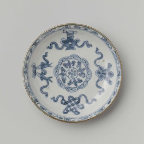 Saucer with a flower rosette and symbolic objects by anonymous