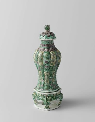 Covered vase with stand, modelled in bamboo-shaped sections with flower sprays by anonymous