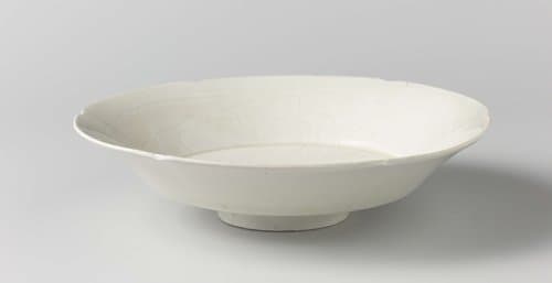 Saucer-dish with incised floral scrolls by anonymous