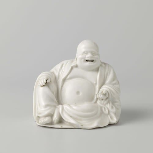 Figure of a seated monk by anonymous