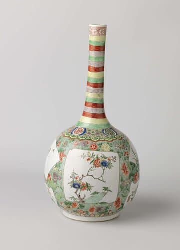 Bottle vase with flower sprays in cartouches in reserve on a speckled green ground by anonymous