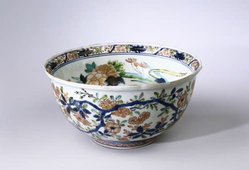 Bowl with flower groups and a continuous flower scroll by anonymous