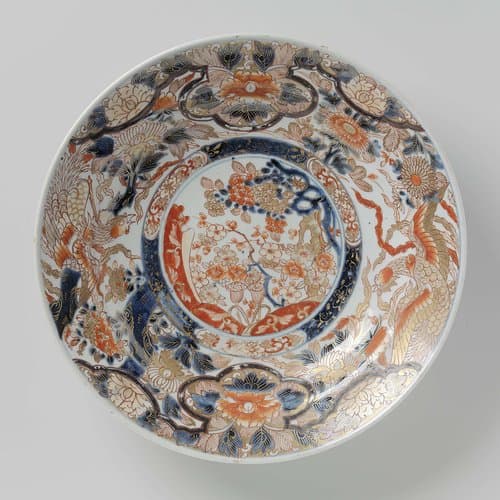 Dish with flowering plants, hoo-birds and flower sprays by anonymous