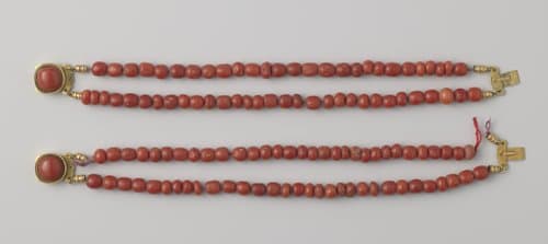 Twee armbanden met bloedkoraal by Adriaan Haast