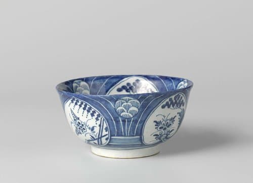 Kom van faience by De Dubbele Schenkkan