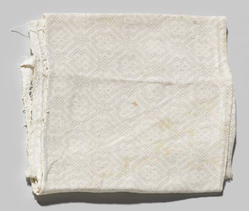 Servet, fragment, met patroon van traliewerk by Unknown Artist