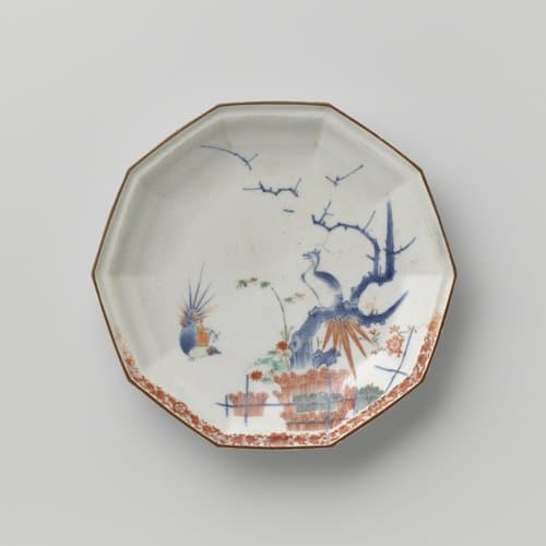 Decagonal dish with brushwood fences, bamboo, prunus and pheasants. by anonymous