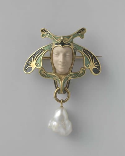 Broche in de vorm van een narrenkop by René Lalique
