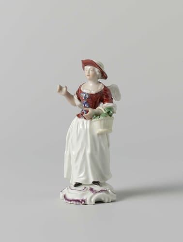 Figure of a woman with wings and a basket