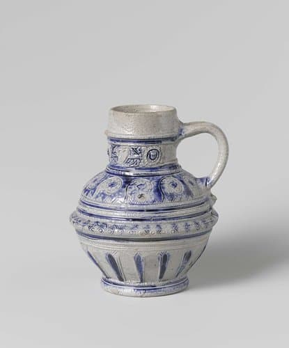 Jug with floral scrolls and masks by anonymous