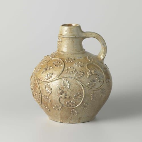 Jug (Bartmann jug) with oak scrolls and a bird by anonymous