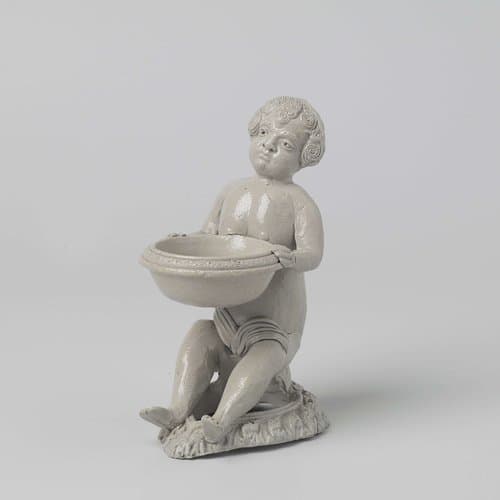 Salt cellar in the shape of a seated figure by anonymous