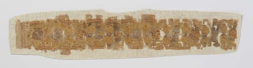 Fragment van een sierstrook in tapijtwerk by anonymous