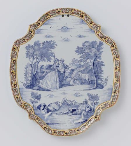 Plaat, ovaal met uitgeschulpte rand met in blauw een herdersscène binnen een veelkleurige bloemenrand by anonymous