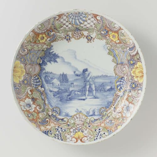 Schotel van faïence met landschap by anonymous