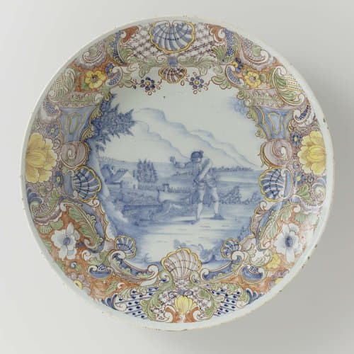Schotel van faïence met landschap by anonymous