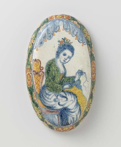 Borstelrug van veelkleurig beschilderde faïence by anonymous