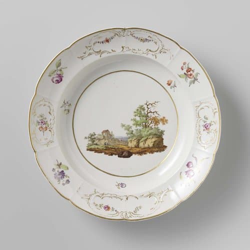 Plate with a landscape and flower sprays in panels