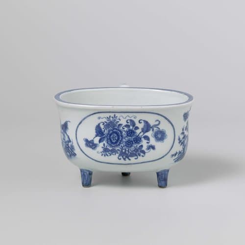 Oval firepot on three legs with medallion, flowers and a rooster by anonymous