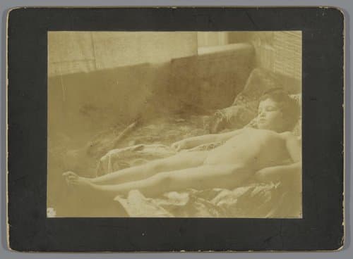 Naakt meisje liggend op bed by George Hendrik Breitner
