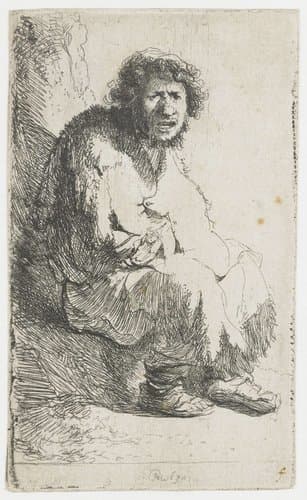 Bedelaar, zittend tegen een heuveltje by Rembrandt van Rijn