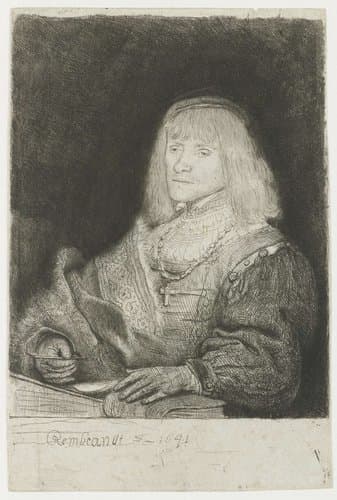 Man at a desk wearing a cross and chain by Rembrandt van Rijn