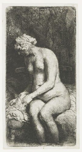 Woman bathing her feet at a brook by Rembrandt van Rijn