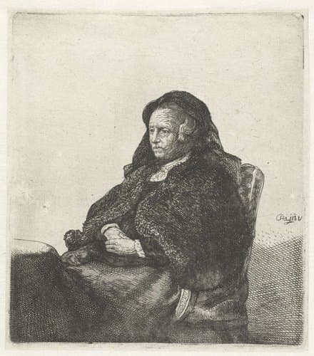 The artist's mother seated at a table by anonymous; Rembrandt van Rijn