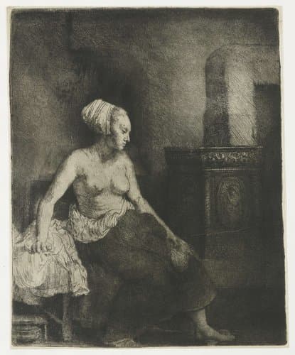Woman sitting half dressed beside a stove by Rembrandt van Rijn