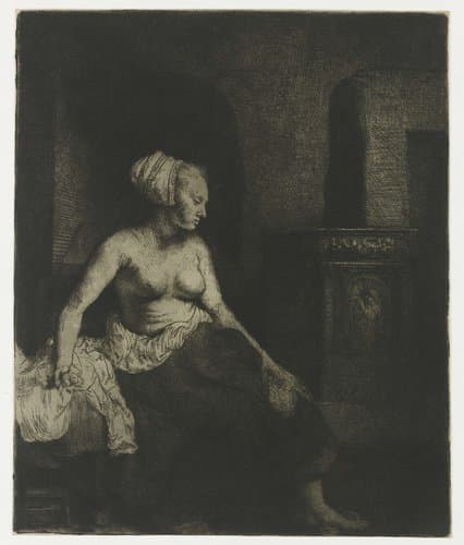 Woman sitting half dressed beside a stove by Rembrandt van Rijn