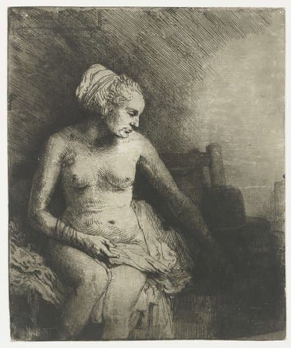 Naakte vrouw met een hoed naast zich by Rembrandt van Rijn