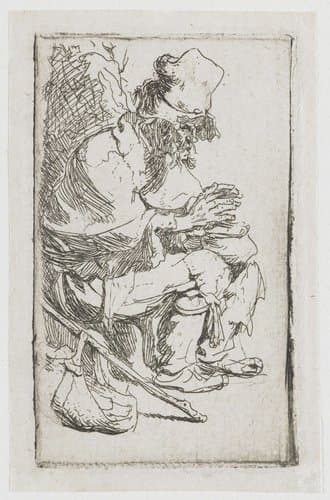 Bedelaar, handen warmend bij een komfoor by Rembrandt van Rijn
